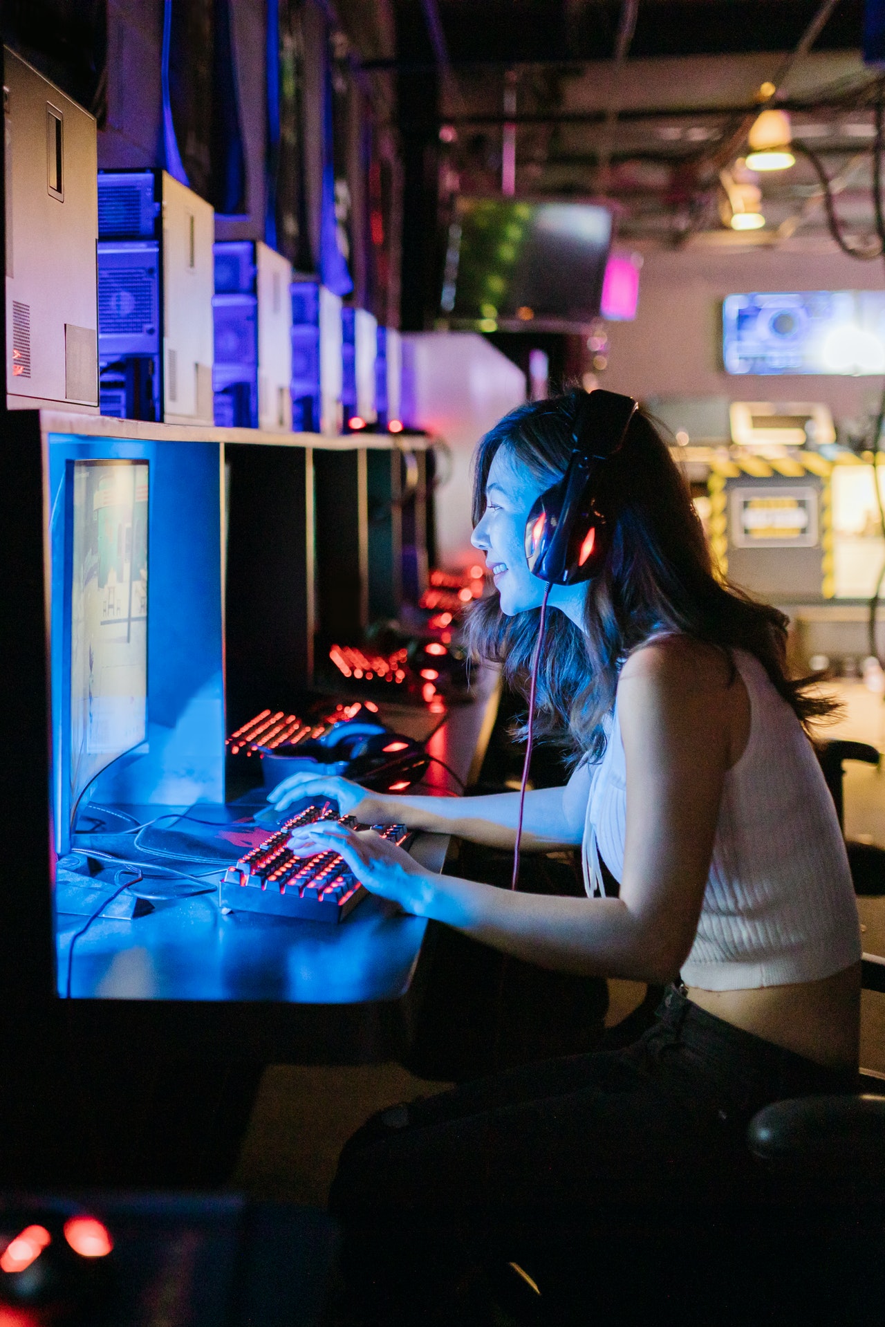 Image of a person playing games in an internet cafe